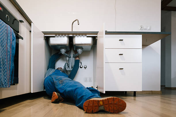 Professional Emergency Plumber technician working in Mayodan, NC